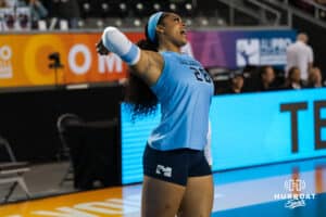Team Hentz Kayla Caffey (#28) throws a ball during the Athletes Unlimited Volleyball match against Team Valentin-Anderson on Thursday, October 9, 2025, in Omaha, Nebraska. Photo by Brandon Tiedemann.