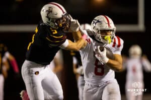 Patriot running back Gabe Prucha (8) throws a Papillion-LaVista defender to the ground during a High School Football game, Friday, October 3, 2025, Lincoln, Nebraska. Photo by Braden Cochran.