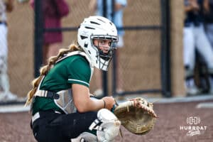 Lincoln Southwest's Morgan Gabel (11) listens for her coach to give her the play during a high school softball game against Elkhorn South on Monday, September 29, 2025, in Omaha, Nebraska. Photo By Jack Stephens.