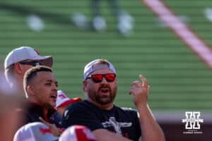 Nebraska Cornhusker fans talking during the game against the Michigan State Spartans during a football game on Saturday, October 4, 2025, in Lincoln, Nebraska. Photo by John S. Peterson.