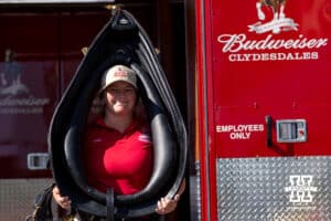 Budweiser employee holding the yoke for a clydesdale they are getting ready for the parade around East Stadium before Nebraska takes on Michigan State during a college football game on Saturday, October 4, 2025, in Lincoln, Nebraska. Photo by John S. Peterson.