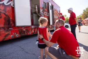 Nebraska Cornhusker fan checks out the Budweiser Clydesdales before Nebraska takes on Michigan State during a college football game on Saturday, October 4, 2025, in Lincoln, Nebraska. Photo by John S. Peterson.