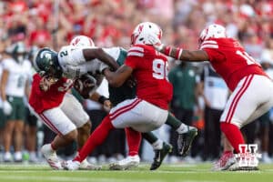 Nebraska Cornhusker defensive lineman Williams Nwaneri (96) sacks Michigan State Spartan quarterback Aidan Chiles (2) in the third quarter during a college football game on Saturday, October 4, 2025, in Lincoln, Nebraska. Photo by John S. Peterson.