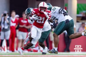 Nebraska Cornhusker running back Emmett Johnson (21) runs with the ball against the Michigan State Spartans in the fourth quarter during a college football game on Saturday, October 4, 2025, in Lincoln, Nebraska. Photo by John S. Peterson.