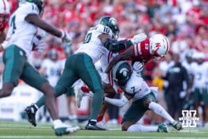 Nebraska Cornhusker wide receiver Nyziah Hunter (13) runs with the ball against Michigan State Spartan cornerback Joshua Eaton (7) in the third quarter during a college football game on Saturday, October 4, 2025, in Lincoln, Nebraska. Photo by John S. Peterson.