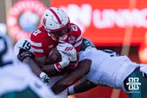 Nebraska Cornhusker running back Emmett Johnson (21) runs with the ball against Michigan State Spartans during a college football game on Saturday, October 4, 2025, in Lincoln, Nebraska. Photo by John S. Peterson.