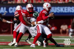 Nebraska Cornhusker quarterback Dylan Raiola (15) sacked by Michigan State Spartan linebacker David Santiago (41) in the second quarter during a college football game on Saturday, October 4, 2025, in Lincoln, Nebraska. Photo by John S. Peterson.