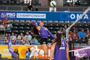 Kayla Caffey (#28) spikes the ball during opening day of Athletes Unlimited Pro Volleyball on Friday, October 3rd, 2025 in Omaha, Nebraska. Photo by Brandon Tiedemann.