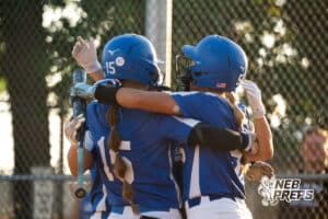 Millard North teammates celebrate with Macey Jarose (15) after a home run during a High School Volleyball game, Thursday, October 2nd, 2025, Lincoln, Nebraska. Photo by Braden Cochran.