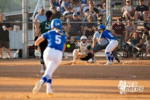 Lincoln Southwest's Maisey Morgan delivers the pitch to Millard North's Mallory Closman (11) with a lead runner on second base during a High School Volleyball game, Thursday, October 2nd, 2025, Lincoln, Nebraska. Photo by Braden Cochran.