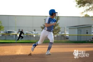 A Millard North base runner prepares to round 3rd base on the way to home plate during a High School Volleyball game, Thursday, October 2nd, 2025, Lincoln, Nebraska. Photo by Braden Cochran.