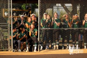 Lincoln Southwest teammates cheer from the dugout for their batter during a High School Volleyball game, Thursday, October 2nd, 2025, Lincoln, Nebraska. Photo by Braden Cochran.
