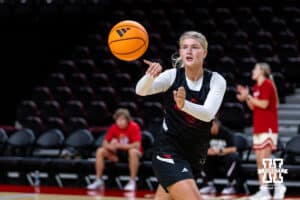 Nebraska Cornhusker Jessica Petrie (12) is running a passing drill during practice on Thursday, October 2, 2025, in Lincoln, Nebraska. Photo by John S. Peterson.