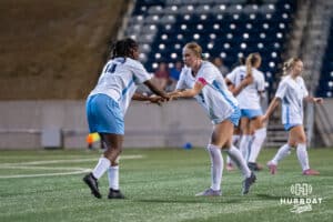 Creighton Bluejays Ariana Mondiri (#14) and Savanna Solomon (#3) high five during a match against Xavier on Wednesday, October 1st, 2025 in Omaha, Nebraska. Photo by Brandon Tiedemann.