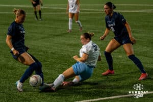 Creighton Bluejay Anna Bragg (#10) slides for the ball during a match against Xavier on Wednesday, October 1st, 2025 in Omaha, Nebraska. Photo by Brandon Tiedemann.