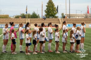 Creighton Bluejay stand during the anthem before a match against Xavier on Wednesday, October 1st, 2025 in Omaha, Nebraska. Photo by Brandon Tiedemann.