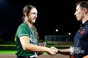 Lincoln Southwest's Maisey McCarty (15) receiving the Hurrdat Sports Big Game Chain after a high school softball game @ Elkhorn South on Monday, September 29, 2025, in Omaha, Nebraska. Photo By Jack Stephens.