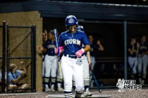 Elkhorn South's Paityn Spencer (18) laughing before she goes up to bat during a high school softball game VS Lincoln Southwest on Monday, September 29, 2025, in Omaha, Nebraska. Photo By Jack Stephens.