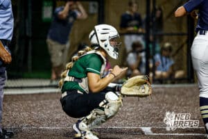 Lincoln Southwest's Morgan Gabel (11) signaling something to the pitcher during a high school softball game @ Elkhorn South on Monday, September 29, 2025, in Omaha, Nebraska. Photo By Jack Stephens.