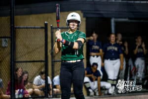 Lincoln Southwest's Morgan Gabel (11) smiles while preparing to go up to bat during a high school softball game @ Elkhorn South on Monday, September 29, 2025, in Omaha, Nebraska. Photo By Jack Stephens.