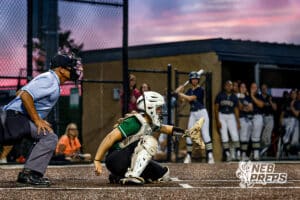 Lincoln Southwest's Morgan Gabel (11) is preparing to catch the ball from a pitch during a high school softball game @ Elkhorn South on Monday, September 29, 2025, in Omaha, Nebraska. Photo By Jack Stephens.