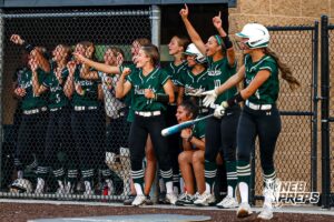 Lincoln Southwest is celebrating after scoring multiple runs during a high school softball game @ Elkhorn South on Monday, September 29, 2025, in Omaha, Nebraska. Photo By Jack Stephens.