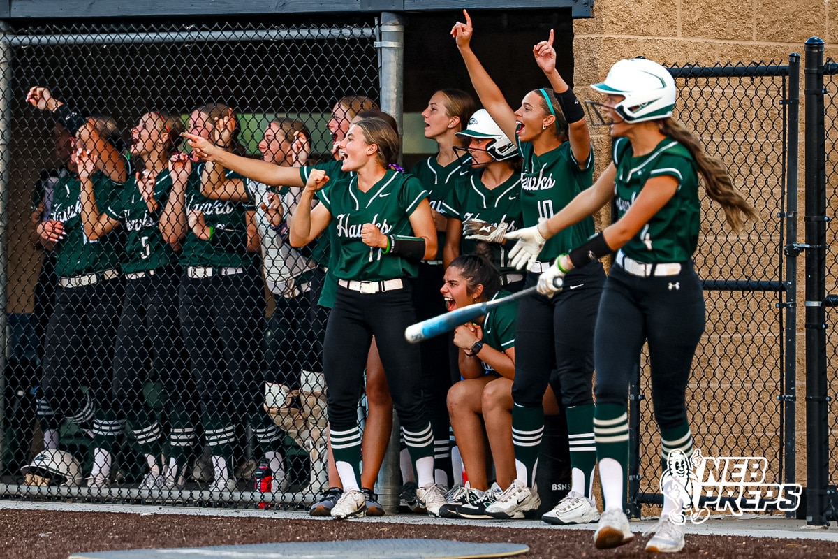 Lincoln Southwest is celebrating after scoring multiple runs during a high school softball game @ Elkhorn South on Monday, September 29, 2025, in Omaha, Nebraska. Photo By Jack Stephens.