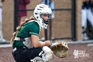 Lincoln Southwest's Morgan Gabel (11) is listening for her coach to give her the play during a high school softball game @ Elkhorn South on Monday, September 29, 2025, in Omaha, Nebraska. Photo By Jack Stephens.