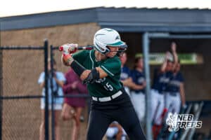 Lincoln Southwest's Maisey McCarty (15) is preparing to swing her bat during a high school softball game @ Elkhorn South on Monday, September 29, 2025, in Omaha, Nebraska. Photo By Jack Stephens.