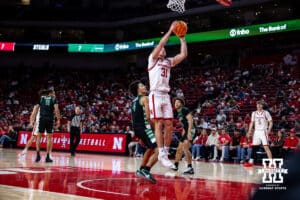Nebraska Cornhusker guard Cale Jacobsen (31) makes a lay up against South Carolina Upstate Spartan guard Carmelo Adkins (4) in the second half during a college basketball game on Saturday, November 29, 2025, in Lincoln, Nebraska. Photo by John S. Peterson.