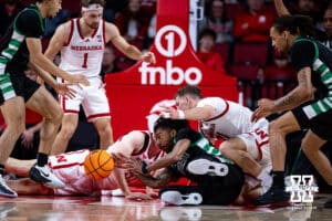 Nebraska Cornhusker forward Rienk Mast (51) and guard Cale Jacobsen (31) go after the loose ball against South Carolina Upstate Spartan guard Tyler Smith (0) in the first half during a college basketball game on Saturday, November 29, 2025, in Lincoln, Nebraska. Photo by John S. Peterson.