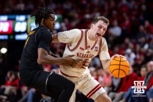 Nebraska Cornhusker guard Cale Jacobsen (31) drives to the basket against Winthrop Eagle forward Pharell Boyogueno (4) in the second half during a college basketball game on Tuesday, Nov. 25, 2025, in Lincoln, Nebraska. Photo by John S. Peterson.