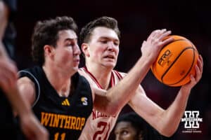 Nebraska Cornhusker forward Pryce Sandfort (21) drives to the basketball against the Winthrop Eagles in the second half during a college basketball game on Tuesday, Nov. 25, 2025, in Lincoln, Nebraska. Photo by John S. Peterson.