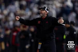 Nebraska Cornhuskers defensive coordinator John Butler signals to a Husker against the Penn State Nittany Lions during a college football game on Saturday, Nov. 22, 2025, in State College, PA. Photo by John S. Peterson.