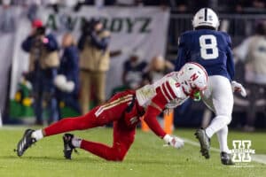 Nebraska Cornhusker defensive back Deshon Singleton (8) tackles Penn State Nittany Lion wide receiver Trebor Pena (8) in the third quarter during a college football game on Saturday, Nov. 22, 2025, in State College, PA. Photo by John S. Peterson.