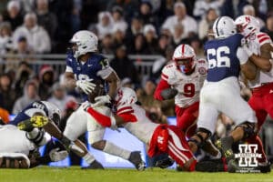 Nebraska Cornhusker defensive back Ceyair Wright (1) makes a tackle against Penn State Nittany Lion running back Kaytron Allen (13) during a college football game on Saturday, Nov. 22, 2025, in State College, PA. Photo by John S. Peterson.