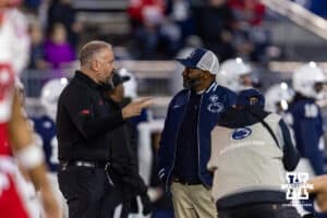 Nebraska Cornhusker head coach Matt Rhule meets with Penn State Nittany Lions interim head coach Terry Smith before a college football game on Saturday, Nov. 22, 2025, in State College, PA. Photo by John S. Peterson.