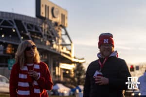 Nebraska Cornhusker fans tailgating outside Beaver Stadium before a college football game against the Penn State Nittany Lions on Saturday, Nov. 22, 2025, in State College, PA. Photo by John S. Peterson.