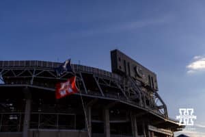Flags fly at the tailgates before the game during a college football game on Saturday, Nov. 22, 2025, in State College, PA. Photo by John S. Peterson.