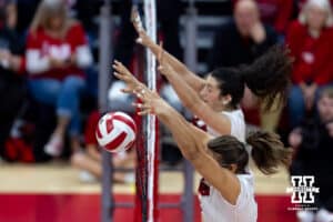 Nebraska Cornhusker middle blocker Rebekah Allick (5) blocks the ball against the Iowa Hawkeyes in the third set during a college volleyball match on Thursday, Nov. 20, 2025, in Lincoln, Nebraska. Photo by John S. Peterson.