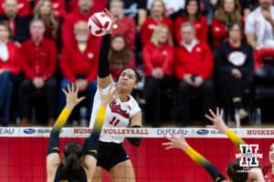Nebraska Cornhusker outside hitter Teraya Sigler (11) spikes the ball against the Iowa Hawkeyes in the second set during a college volleyball match on Thursday, Nov. 20, 2025, in Lincoln, Nebraska. Photo by John S. Peterson.