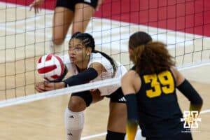 Nebraska Cornhusker outside hitter Taylor Landfair (12) makes a saves against the Iowa Hawkeyes in the first set during a college volleyball match on Thursday, Nov. 20, 2025, in Lincoln, Nebraska. Photo by John S. Peterson.