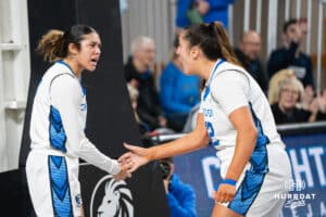 Creighton Bluejays Kiani Lockett (11) and Grace Boffeli (42) celebrate a made basket during a basketball game against Northern Iowa on Thursday, Nov 20, 2025, in Omaha, Nebraska. Photo by Brandon Tiedemann.