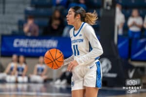 Creighton Bluejay Kiani Lockett (11) takes the ball up court during a basketball game against Northern Iowa on Thursday, Nov 20, 2025, in Omaha, Nebraska. Photo by Brandon Tiedemann.