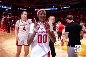 Nebraska Cornhusker guard Alanna Neale (00) holds up a W for the win against the Oral Roberts Golden Eagles during a college basketball game on Wednesday, Nov. 19, 2025, in Lincoln, Nebraska. Photo by John S. Peterson.