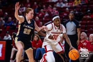 Nebraska Cornhusker guard Alanna Neale (00) dribbles the ball against Oral Roberts Golden Eagle guard Bella Edwards (20) in the fourth quarter during a college basketball game on Wednesday, Nov. 19, 2025, in Lincoln, Nebraska. Photo by John S. Peterson.