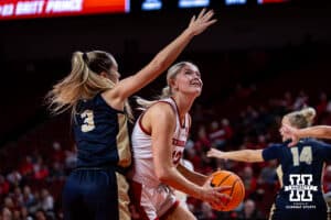 Nebraska Cornhusker forward Jessica Petrie (12) makes a lay up against Oral Roberts Golden Eagle guard Anna Trusty (3) in the fourth quarter during a college basketball game on Wednesday, Nov. 19, 2025, in Lincoln, Nebraska. Photo by John S. Peterson.