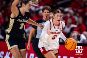 Nebraska Cornhusker guard Logan Nissley (2) dribbles the ball against Oral Roberts Golden Eagle guard Anna Trusty (3) during a college basketball game on Wednesday, Nov. 19, 2025, in Lincoln, Nebraska. Photo by John S. Peterson.