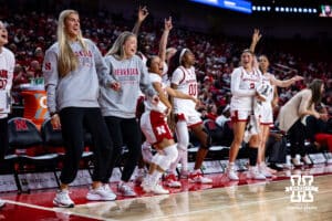 The bench mob celebrates Britt Prince's three-point shot against the Oral Roberts Golden Eagles during a college basketball game on Wednesday, Nov. 19, 2025, in Lincoln, Nebraska. Photo by John S. Peterson.