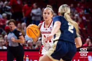 Nebraska Cornhusker guard Callin Hake (14) dribbles the ball against Oral Roberts Golden Eagle guard Gentry Baldwin (2) in the first quarter during a college basketball game on Wednesday, Nov. 19, 2025, in Lincoln, Nebraska. Photo by John S. Peterson.